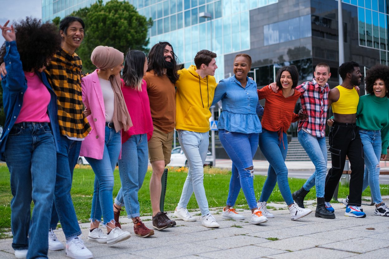 Group of friends from different cultures and ethnicities enjoying